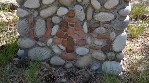 Historic Forest Service logo in rock camper check-in station.