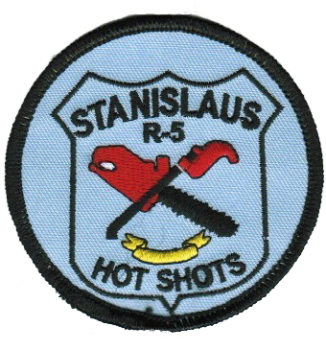 Stanislaus hotshot patch logo shows a chainsaw and other firefighter tools.
