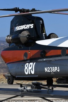 If the small drone on the table is flown, the very large helicopter in the background can't fly.