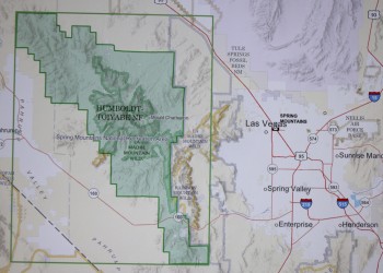 A map highlighting the Spring Mountains National Recreation Area, a green bordered region within a larger map of the surrounding Nevada landscape, including major cities and highways.
