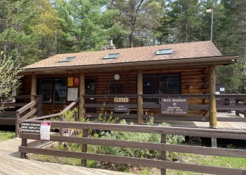 A cabin offering information with an accessible ramp