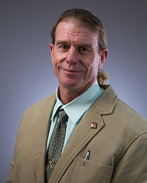 Photo of a man in a suit
