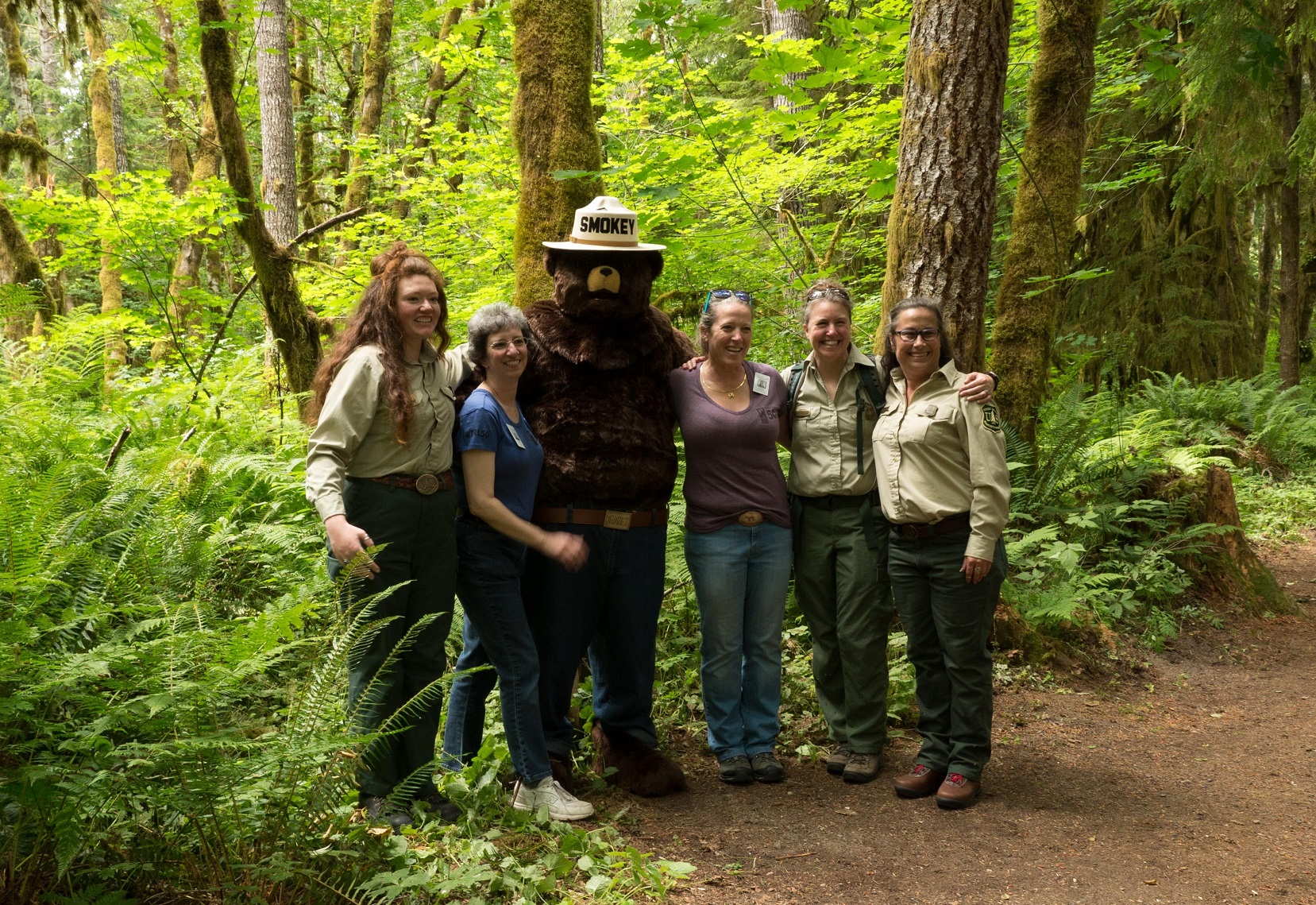 Smokey Bear and forest staff