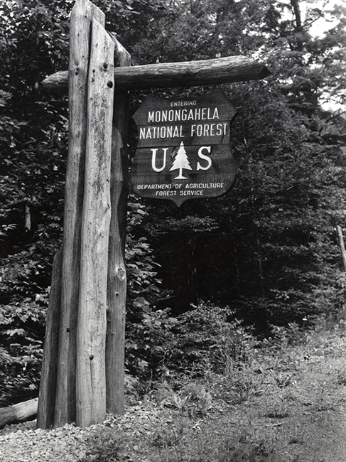 Early roadside entrance sign welcoming drivers to Monongahela National Forest, circa 1950. (USDA Forest Service photo)