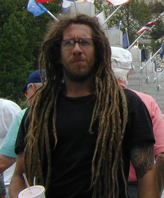 Photo of firefighter with long dreads