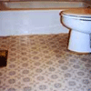 Photo of a bathroom with vinyl flooring.