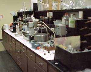Photo of a cluttered lab counter.