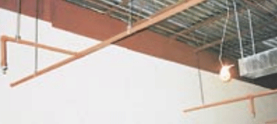 Photo of an indoor fire sprinkler system.
