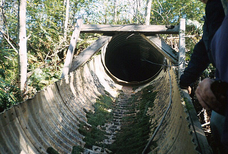 Outlet half pipe to protect fillslope from erosion. Caution: this treatment can accelerate flow and increase downsteam erosion potential.