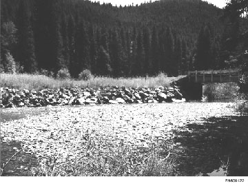 Figure 16Monture Bridge, Lolo National Forest.  Repair of abutment fill failure and use of riprap as a scour countermeasure.