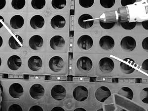 Photo of a corner of GeoBlock showing the placement of the screws used to fasten the panels together.