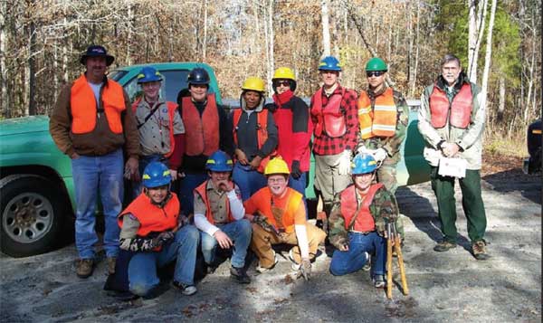 Photo of a group of Boy Scouts that are about to work on a horse trail.