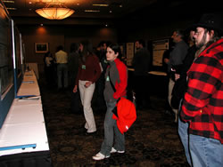 FVS Conference attendees looking at displays at the poster session.