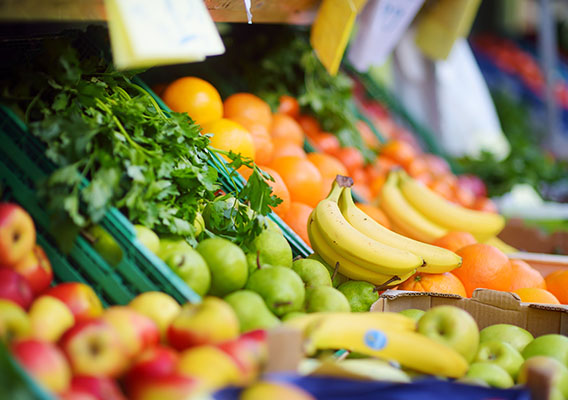 fruits and vegetables in a bin