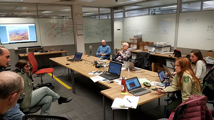 Forest Service employees managing a Question & Answer session for the Fire deep dive webinar.