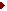[Graphic]: Small arrow bullet graphic.