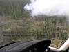 [photo]. An aerial view of the Little Salmon Fire as it burns into the 1985 Charlotte Fire. The earlier fire is visible because of a reduction of vegetation. Select for a larger photo.