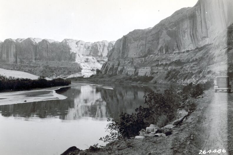 Canyon of Colorado River above Moab, Utah. Deposits of sediment brought down from upstream are laid down behind the curves of the channel and exposed at low water.