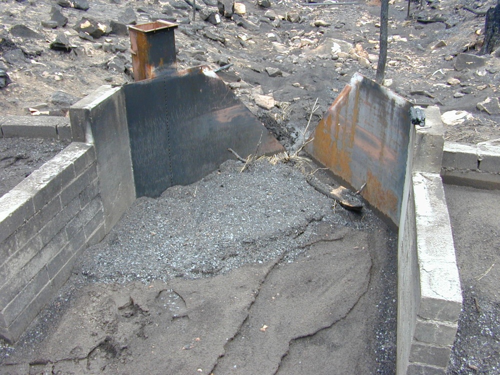 Decommisioned V-Notch weir destroyed by the fire and floowing flood.