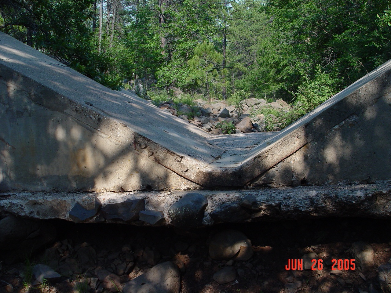 The v-nothc weir of the Watershed 7 is severely damaged 25 years after operation ceased here.
