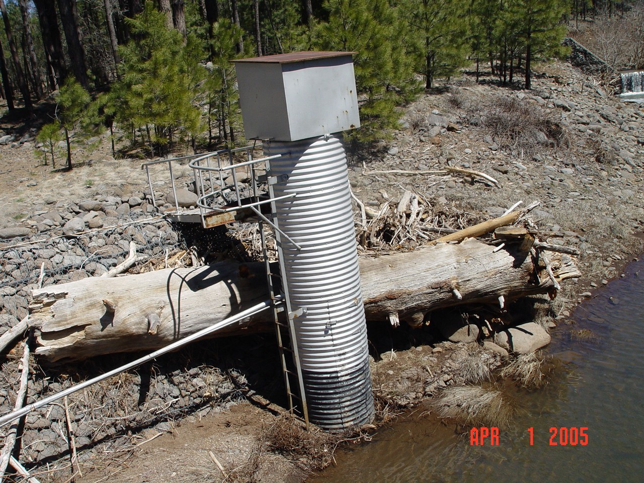 A view from the gondola of debris deposited behind the stilling well.