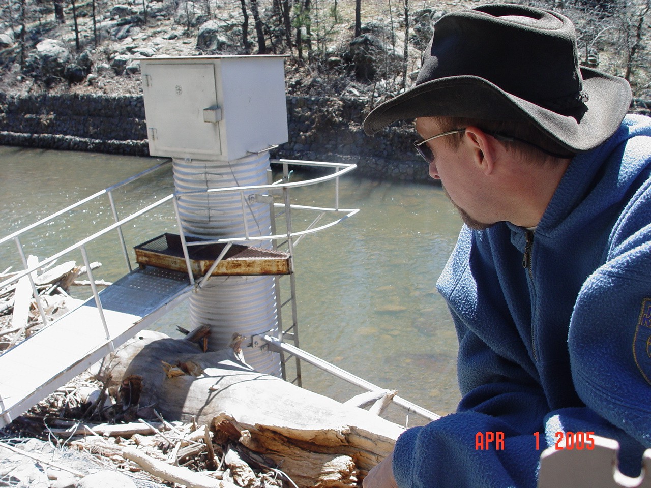 Boris is inspecting the debris deposited behind the stilling well from the gondola.
