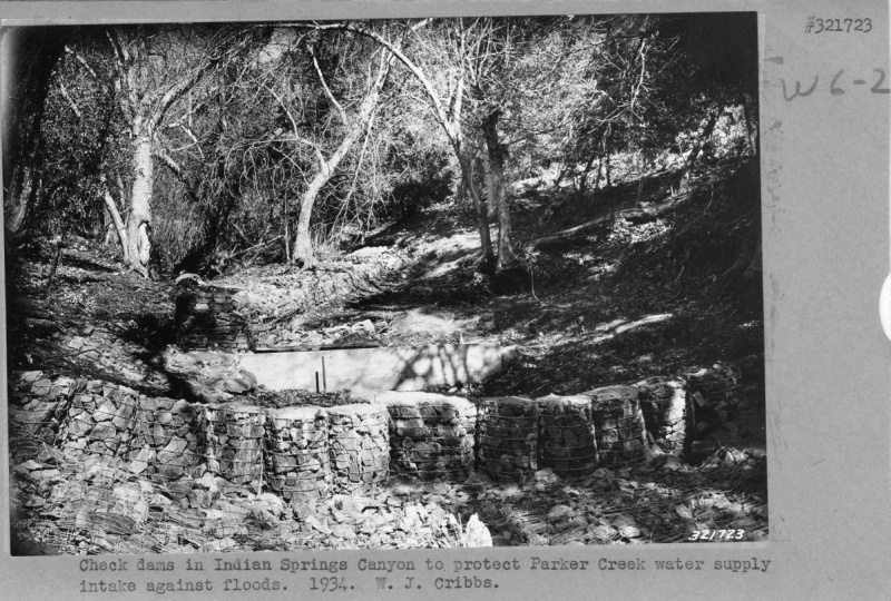 Dams of rock cylinders