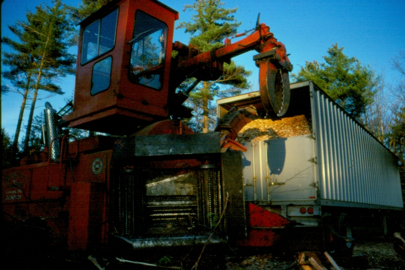 Truck being loaded with chips at the landing in the Logging Study, in MU2 in 1984