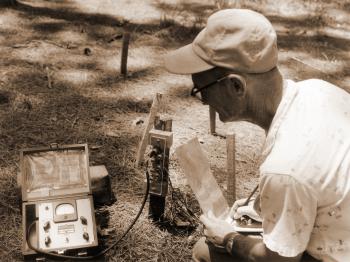 Equipment used to determine soil moisture.  Note plexiglas board with tier of phonejacks and phone plug from an amperage meter.