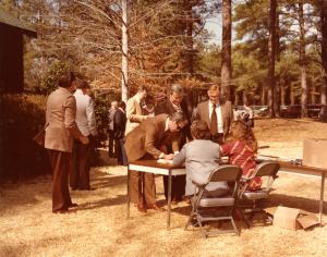 Registering people to attend the February 14, 1979, ceremony for the reopening of the Crossett Experimental Forest.