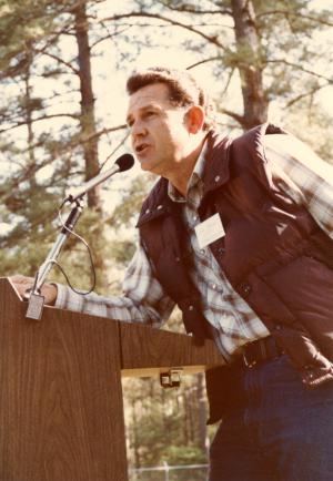 Dr. James Baker (unit project leader) addressing attendees of a Crossett Forestry Field Day, probably in the late 1980s.
