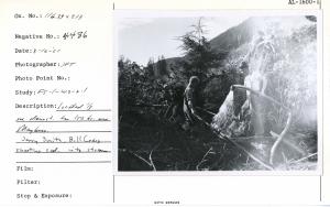 Located 1/3 mile downstream from 150 bridge over Maybeso Creek. Jerry Smith, Bill Craig shooting sediment into stream. [Photographer possibly John Tallmadge.]
