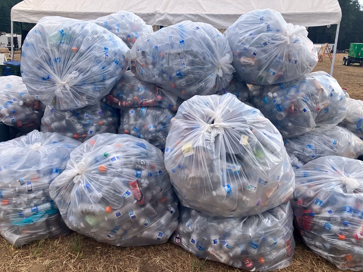 "Bags of plastic bottles for recycling."