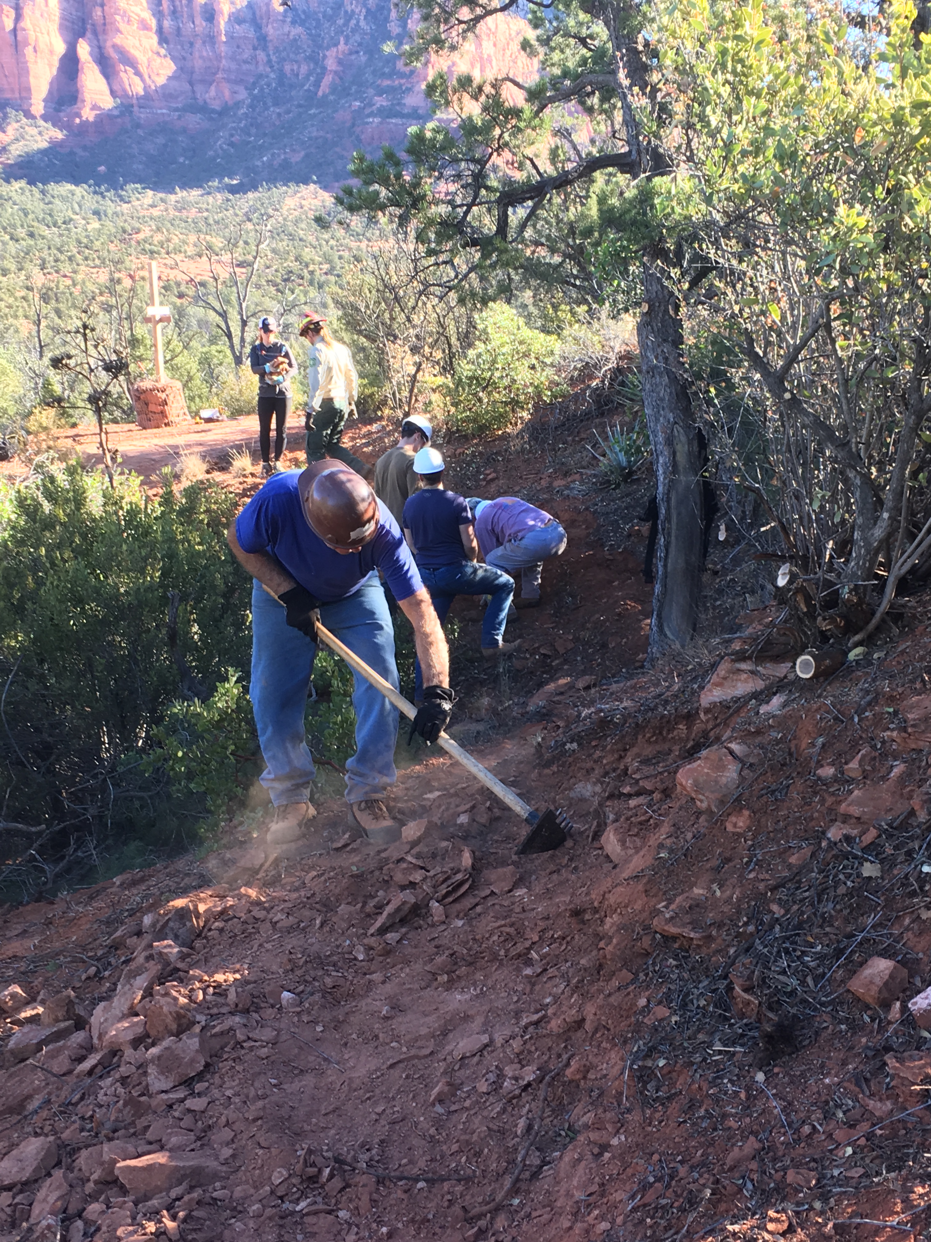 Image of workers working on a trail.