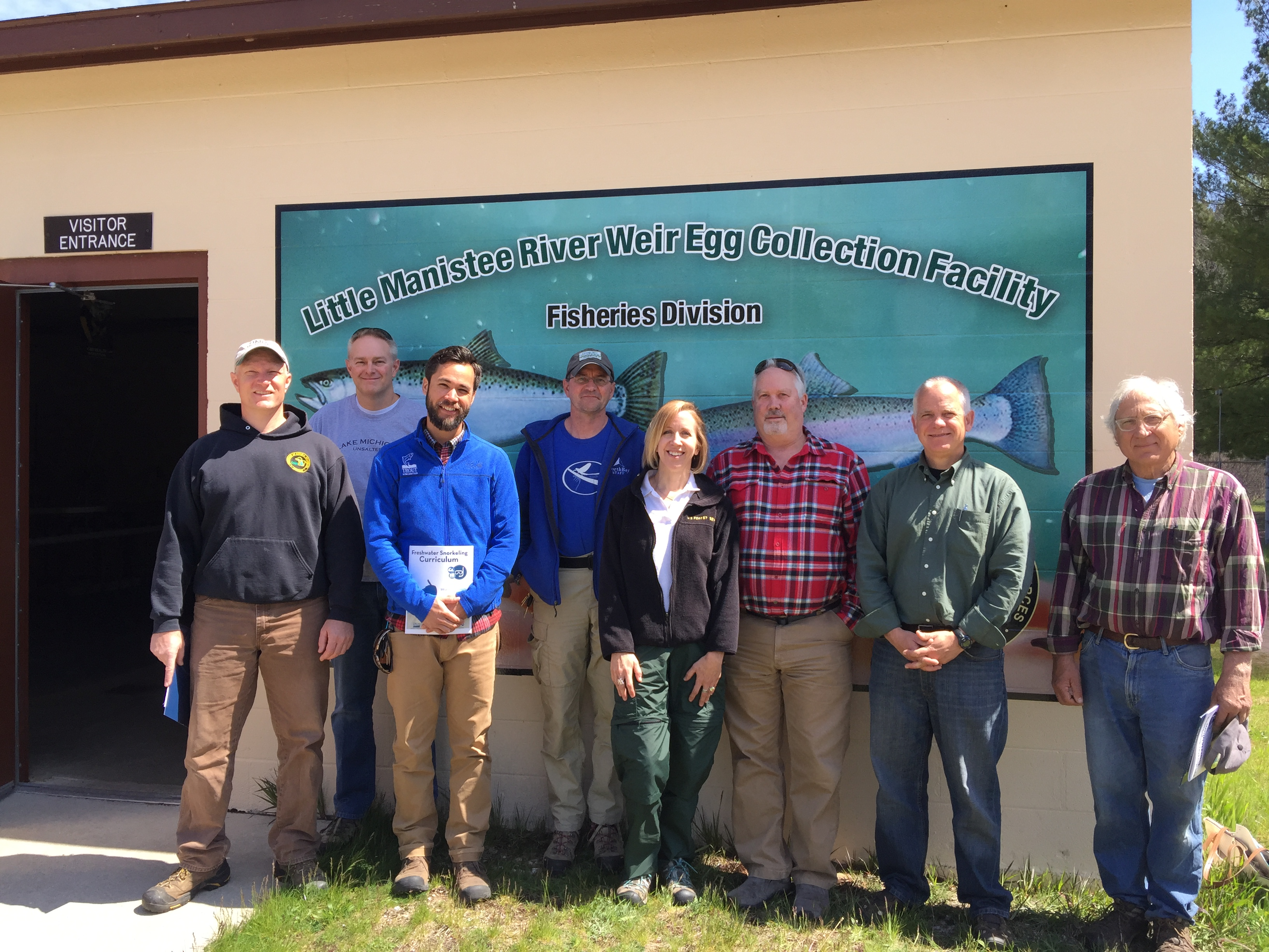 Group photo showing DNR staff, Forest Service staff, North Bay, and the Spirit of the Bear Club members