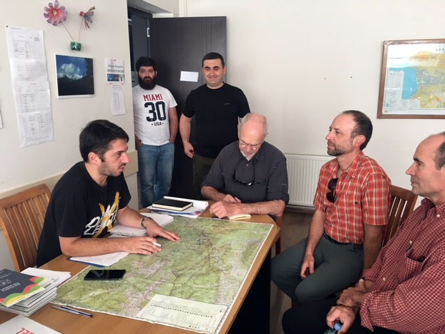 People studying a map.