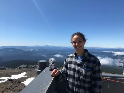 Miriam Smith stands on an overlook.