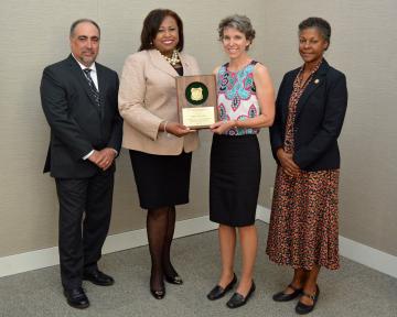 Peggy receiving the 2015 Managerial Engineer of the Year Award. 