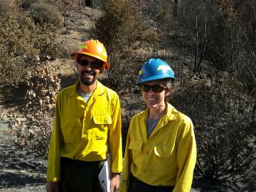 Peggy on a Burned Area Emergency Response or BAER assignment with Hailu Gabriel on Colville National Forest. 