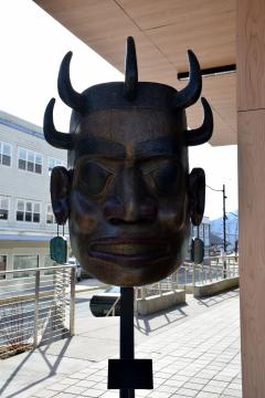 Close-up of mask representing Tlingit, Haida and Tsimshian peoples of Southeast Alaska.