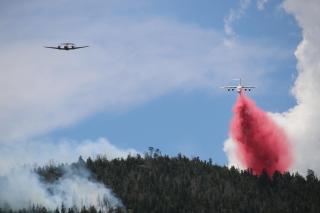 Retardant drop over Cove Creek Fire