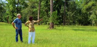 Forest Service researcher John Schelhas and landowner Eleanor Cooper Brown discuss her family’s land and forests.