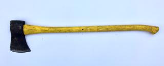 A single-bit axe laying a light blue background.