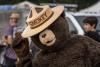 Image shows Smokey giving the high sign to the camera.