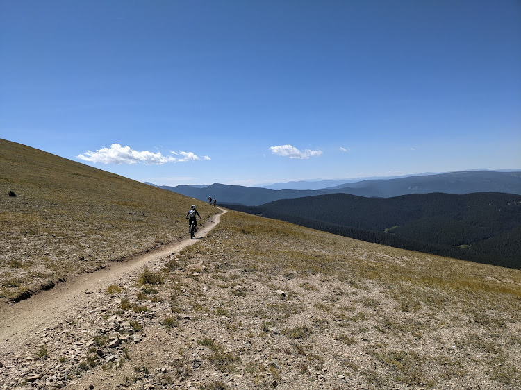 Bikers enjoy the picturesque view on the Continental Divide National Scenic Trail
