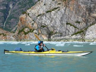 A person floats by in a kayak.
