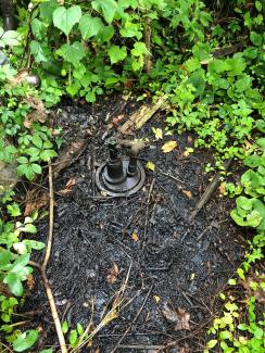 orphaned well that is polluting the surrounding landscape with oil.jpg orphaned well that is polluting the surrounding landscape with oil