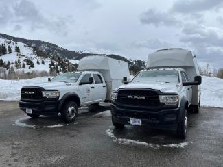 Two White Trucks
