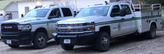 Two White Trucks