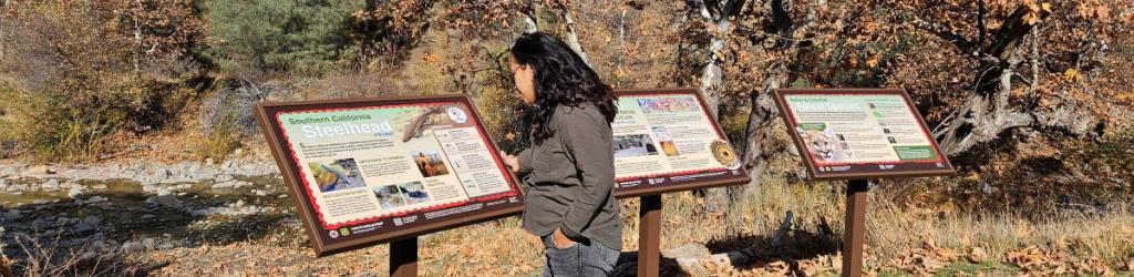 Chumash sign project three panels with visitor
